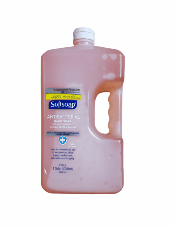 Large Softsoap hand soap container with pink soap inside.