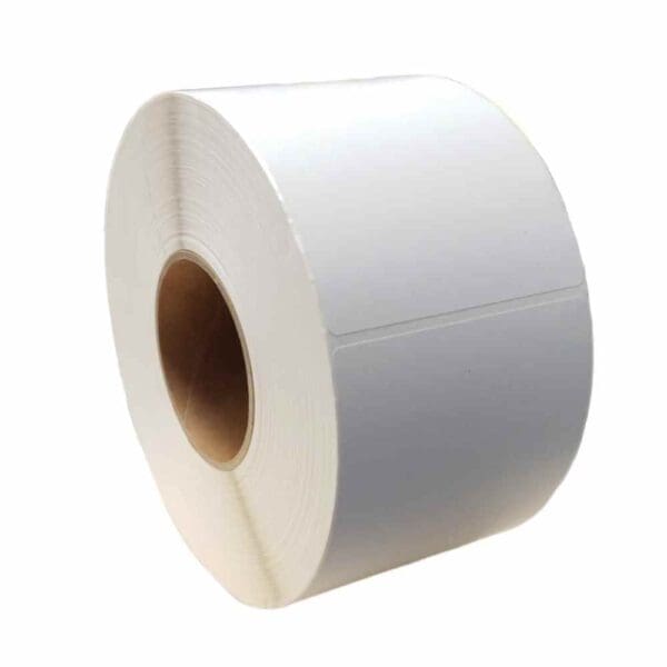 A large roll of blank white adhesive labels.