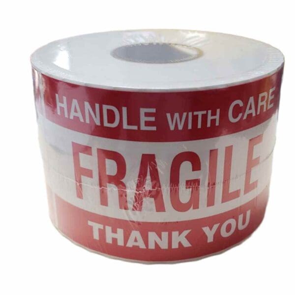 Roll of red and white fragile warning tape.