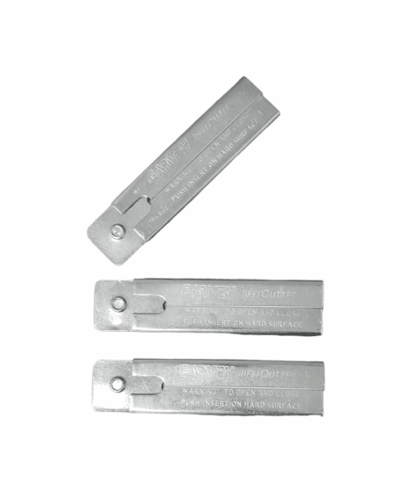 Three metal stapler blade refills arranged against a white background.