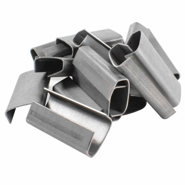 A pile of metal cable clips used for securing wires.