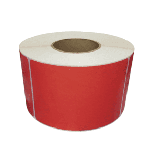 Roll of red adhesive labels on a white core.