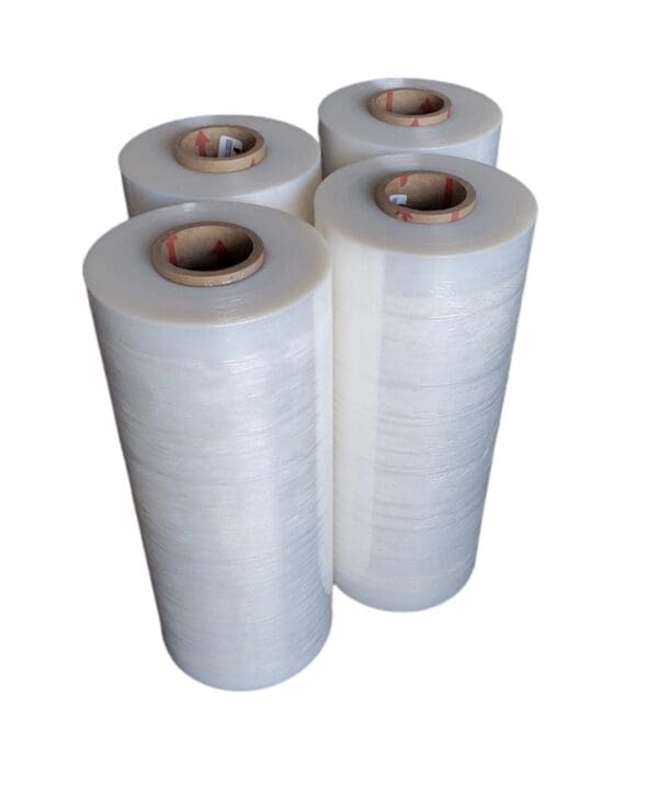 Four rolls of clear plastic stretch wrap.