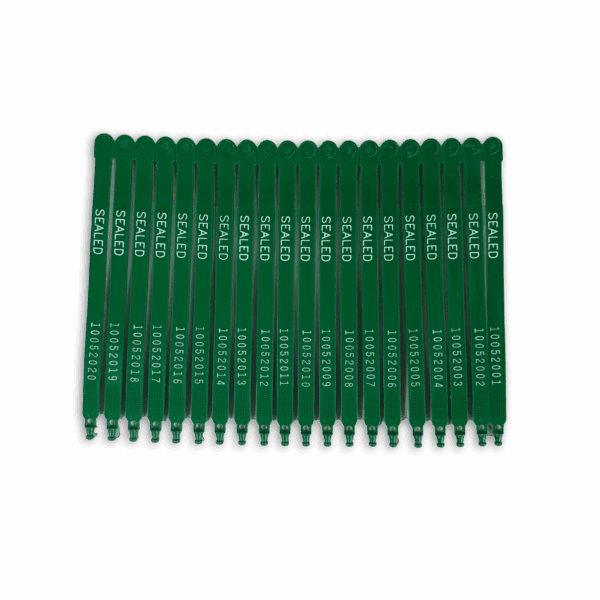 A set of green screwdrivers with various tips arranged in a row.