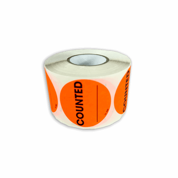 A roll of orange labels with the word 'COUNTED' printed on them.