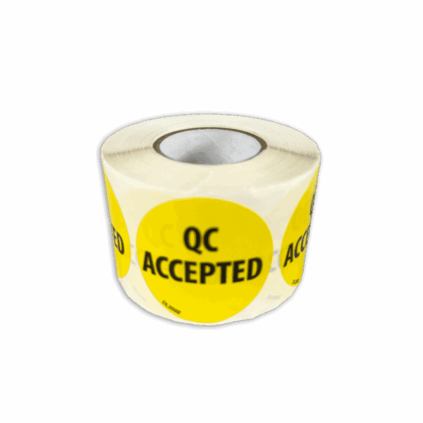 Roll of yellow QC Accepted stickers for quality control.