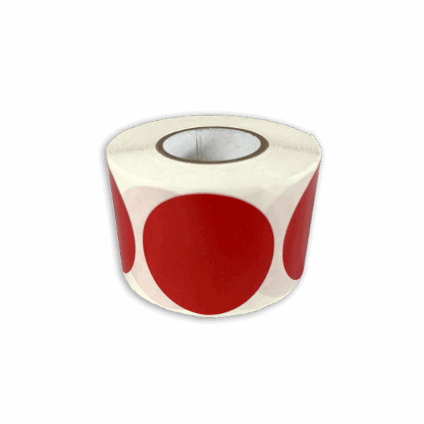 Roll of white stickers with large red dots.