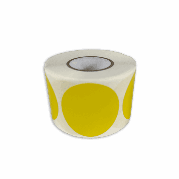 Roll of white adhesive labels with large yellow dots.