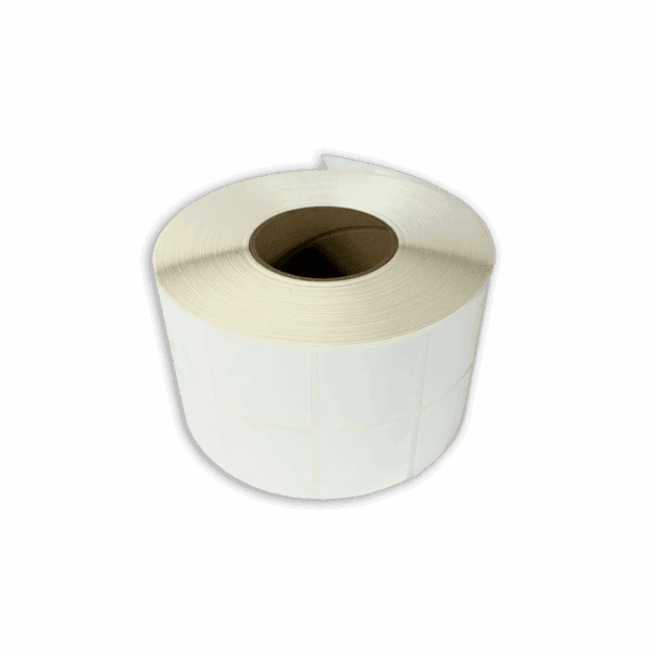 A roll of white adhesive labels with a cardboard core.