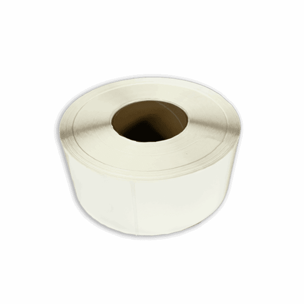 Roll of blank white adhesive labels on a brown core.