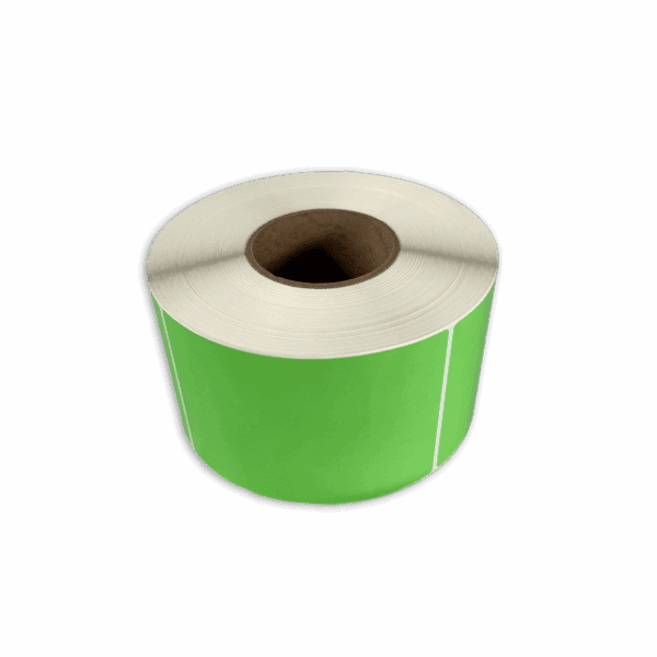 A roll of green adhesive labels with a cardboard core.