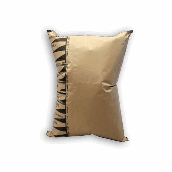A beige pillow with a striped black and beige edge on a black background.